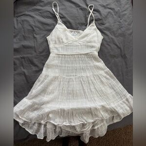 Keliki white linen mini dress, with open back detail